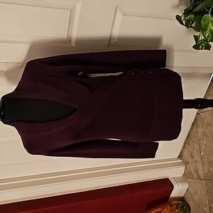 Venus sweater or mini dress sweater.  Large size with criss cross design on side